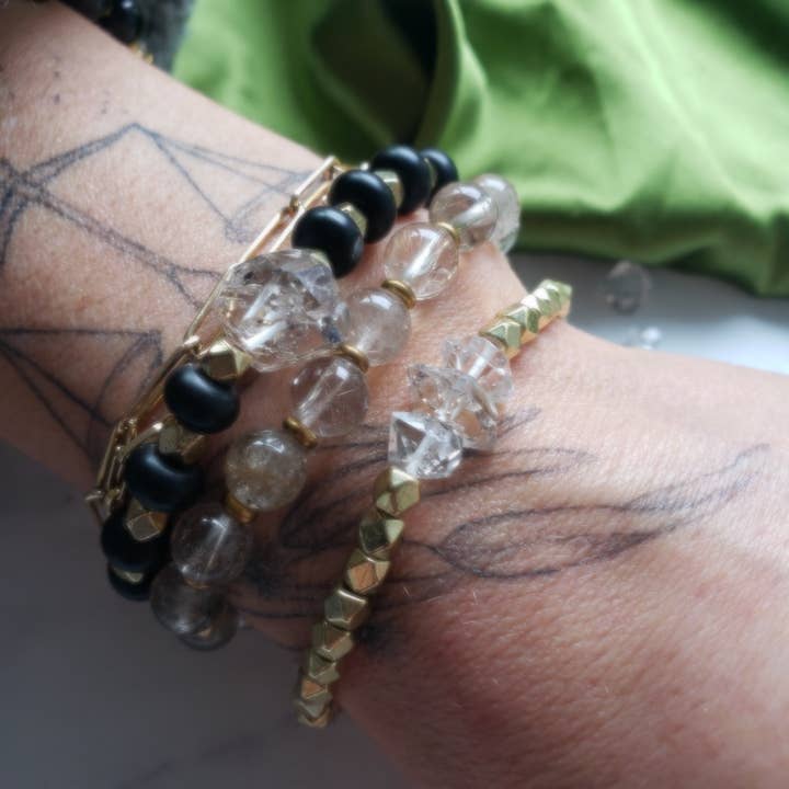 
                  
                    Dreamers of Dreams - Brass and Diamond Quartz beaded stretchy Bracelet
                  
                