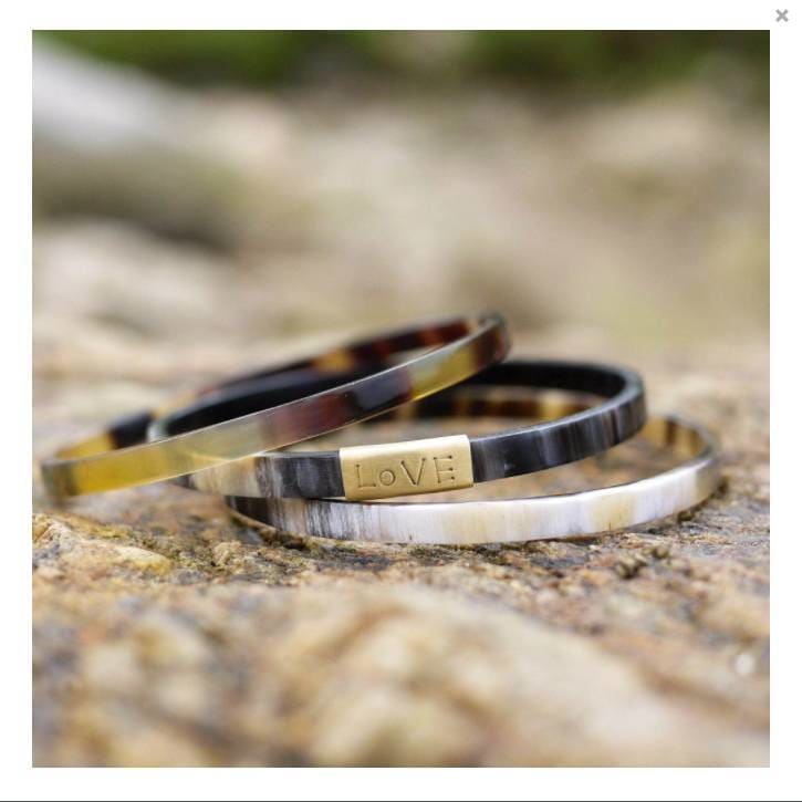 
                  
                    Tortoise Trinty Horn Bangle - Pink Pig
                  
                